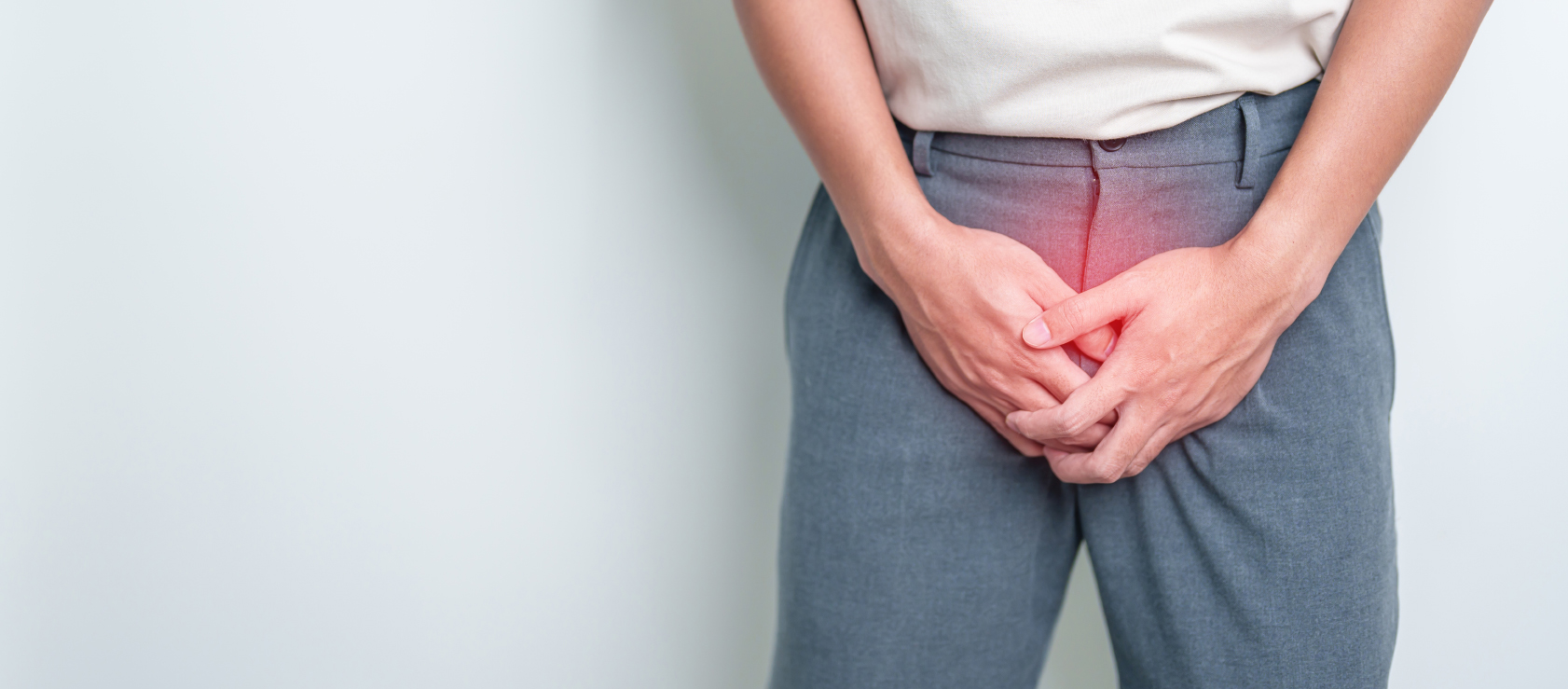 A man experiencing discomfort in the prostate gland.