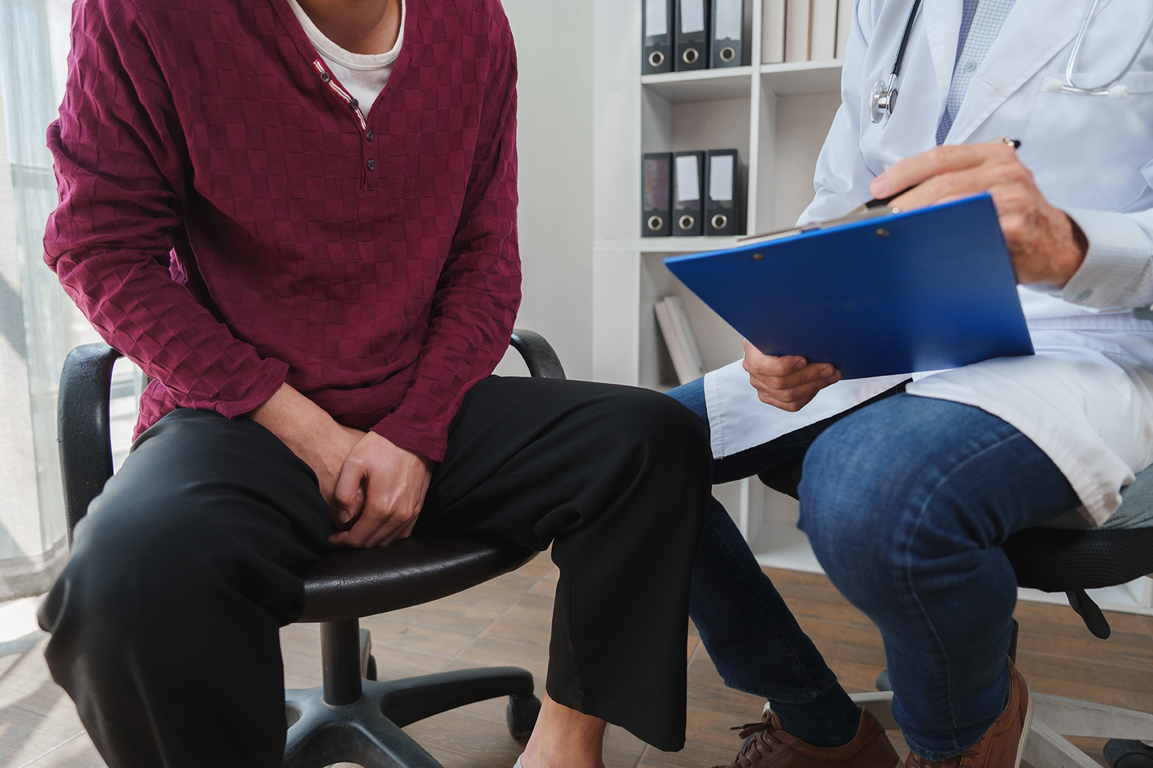 A man consulting a urologist for low sperm count treatment
