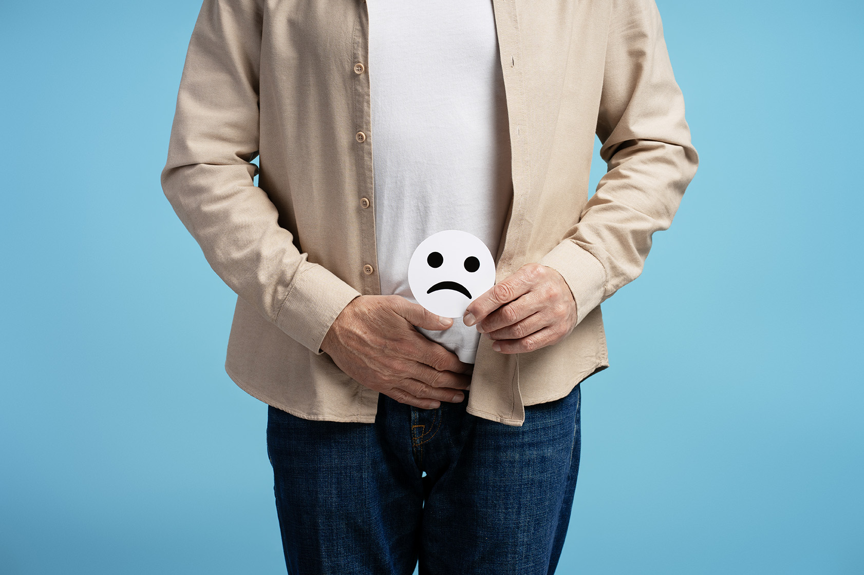 Man experiencing urinary incontinence